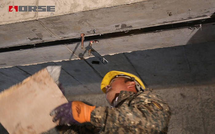 Reinforced Concrete Beam Strengthened With Prestressed Carbon Fiber Strip Reinforced Concrete Beam Strengthened With Prestressed Carbon Fiber Strip