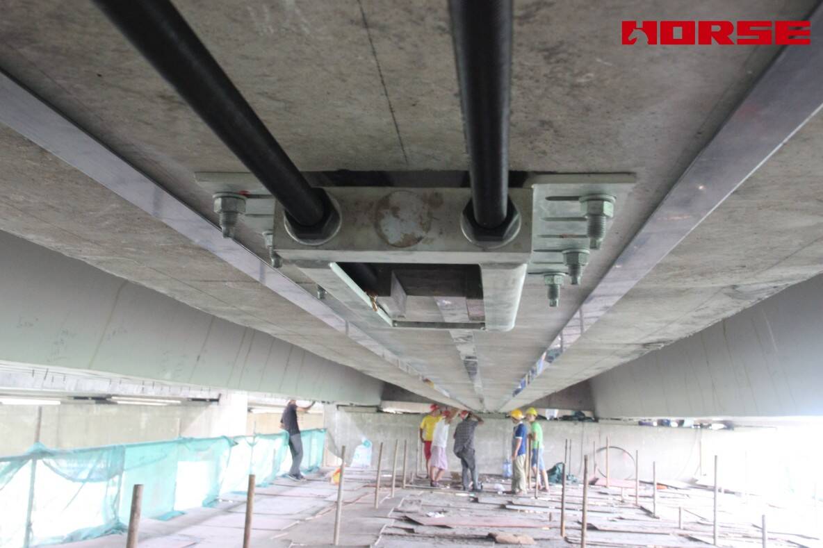 Pre-stress Carbon Fiber Laminates "Lock" Concrete Cracks